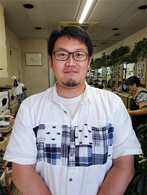 部長 成田浩一